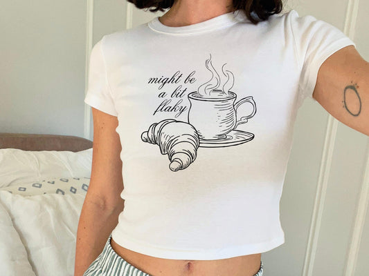 Might Be A Bit Flaky Baby Tee, Funny Slogan T-Shirt, Coffee Club Shirt, Croissant Shirt, Coffee Lover Shirt, Womens White Baby Tee T-Shirt